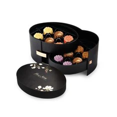 Casella di rigalu di cioccolatu scuru